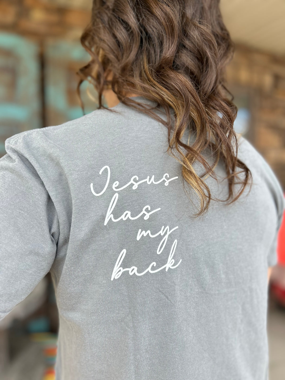 Jesus Has My Back Graphic Tee-Graphic Tees-Ask Apparel-Evergreen Boutique, Women’s Fashion Boutique in Santa Claus, Indiana